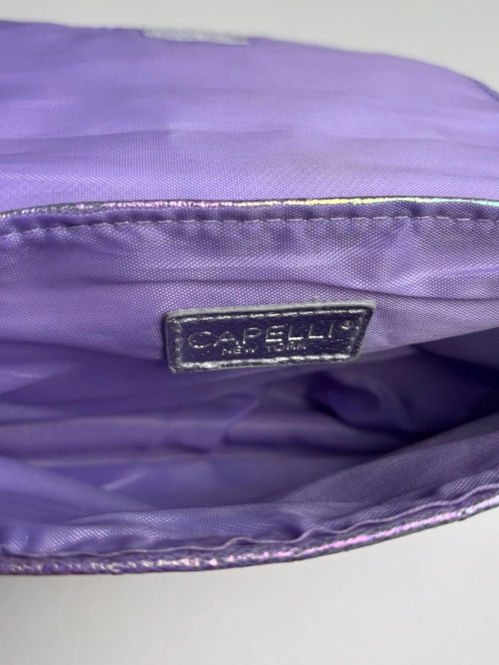 Capelli of New York Iridescent Purple Quilted Heart Crossbody